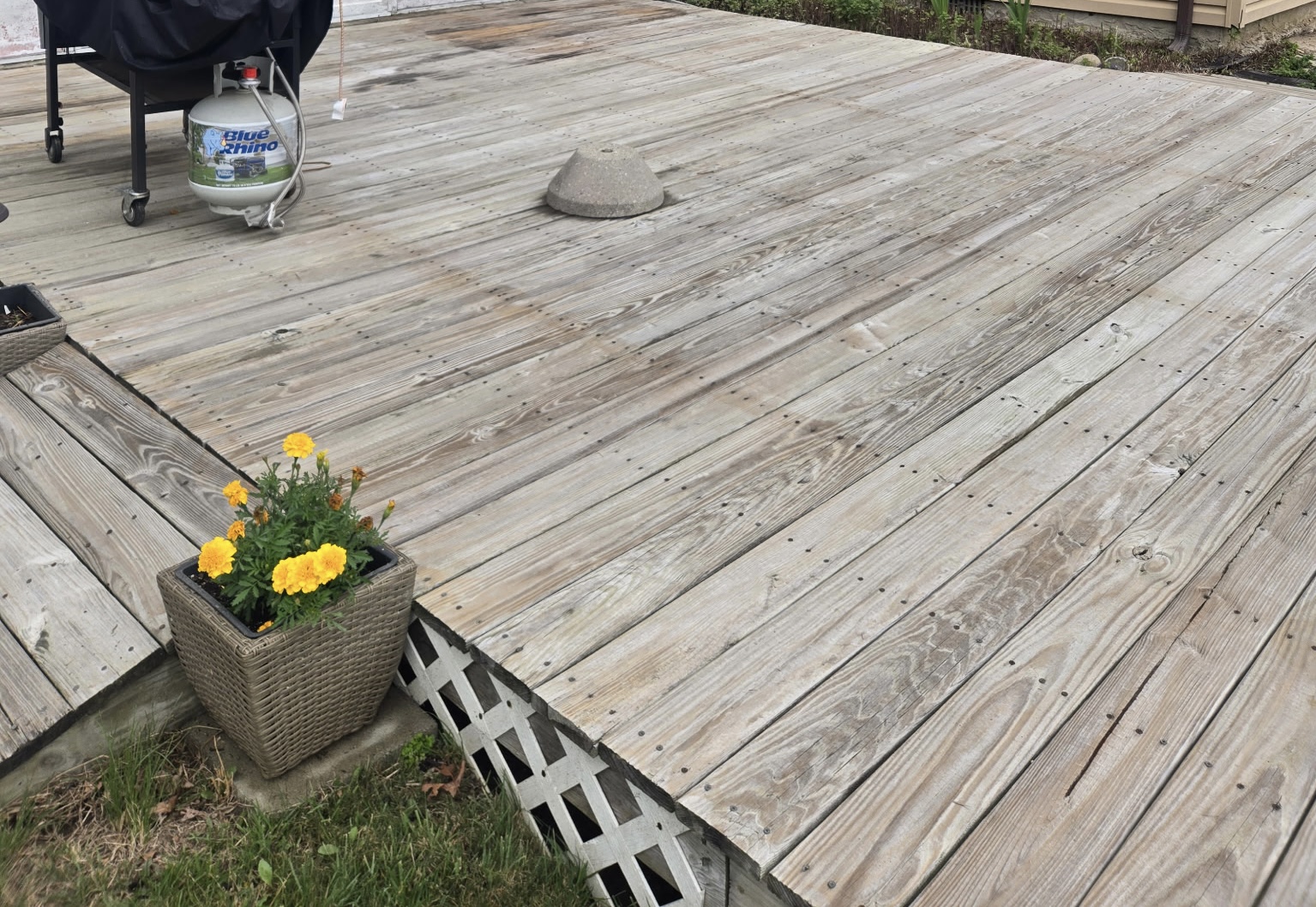 Wooden deck surface after pressure washing