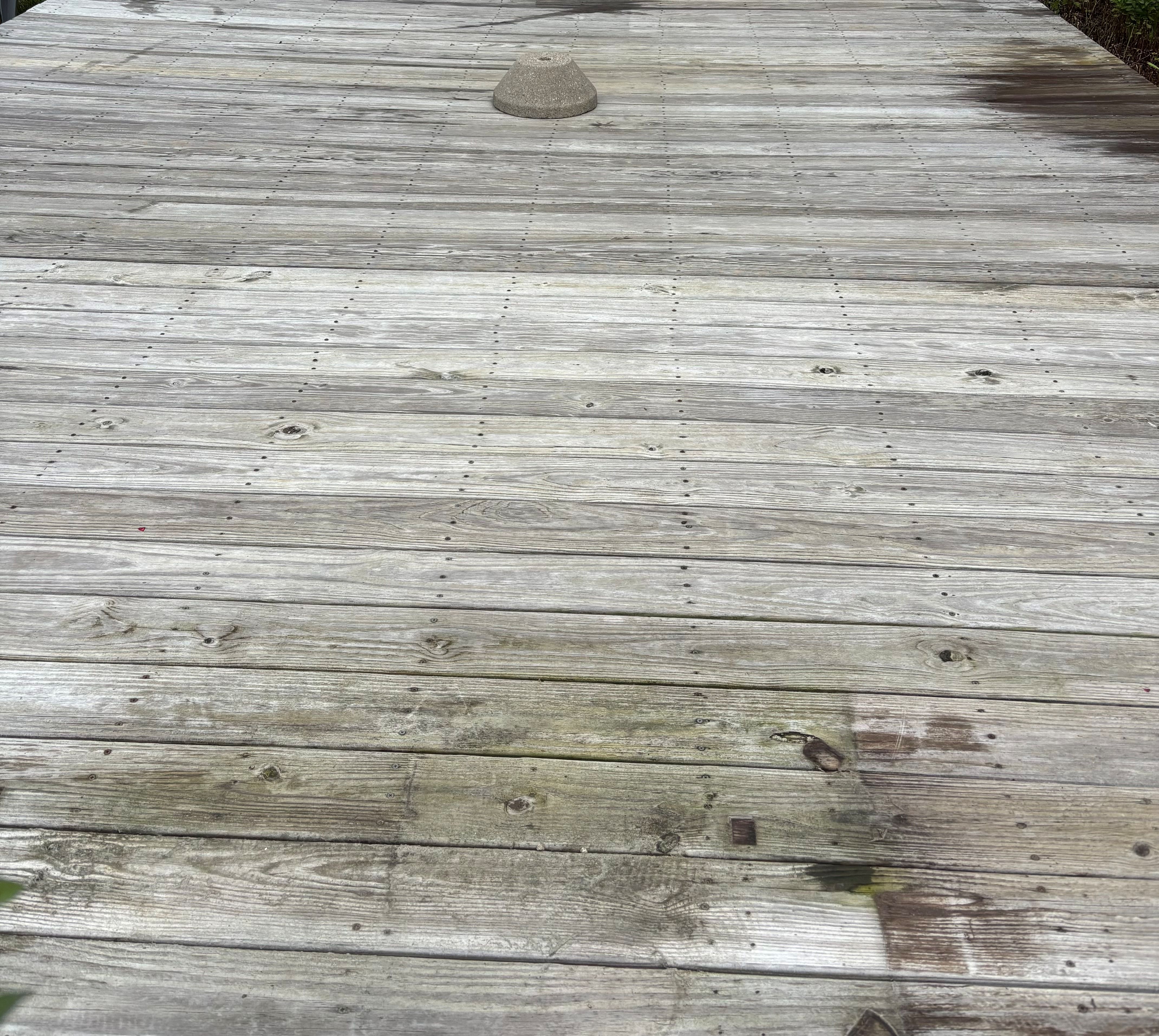 Wooden deck surface before pressure washing