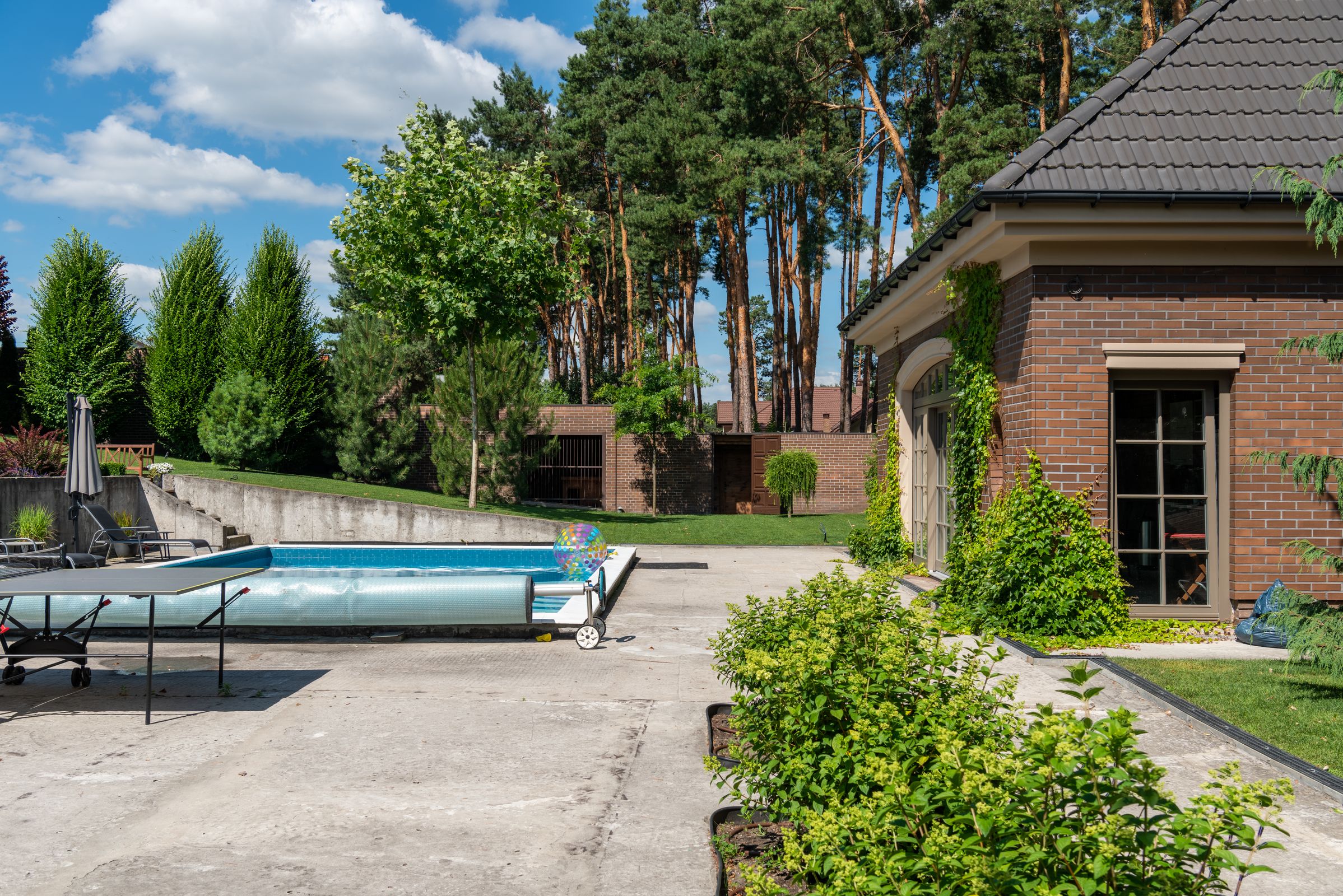 Bright clean backyard patio and pool area